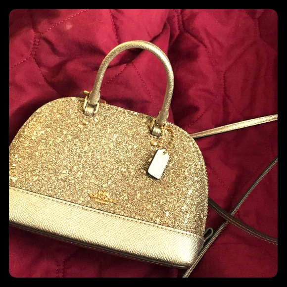 Rose gold Coach purse. Only used twice. - Picture 1 of 3